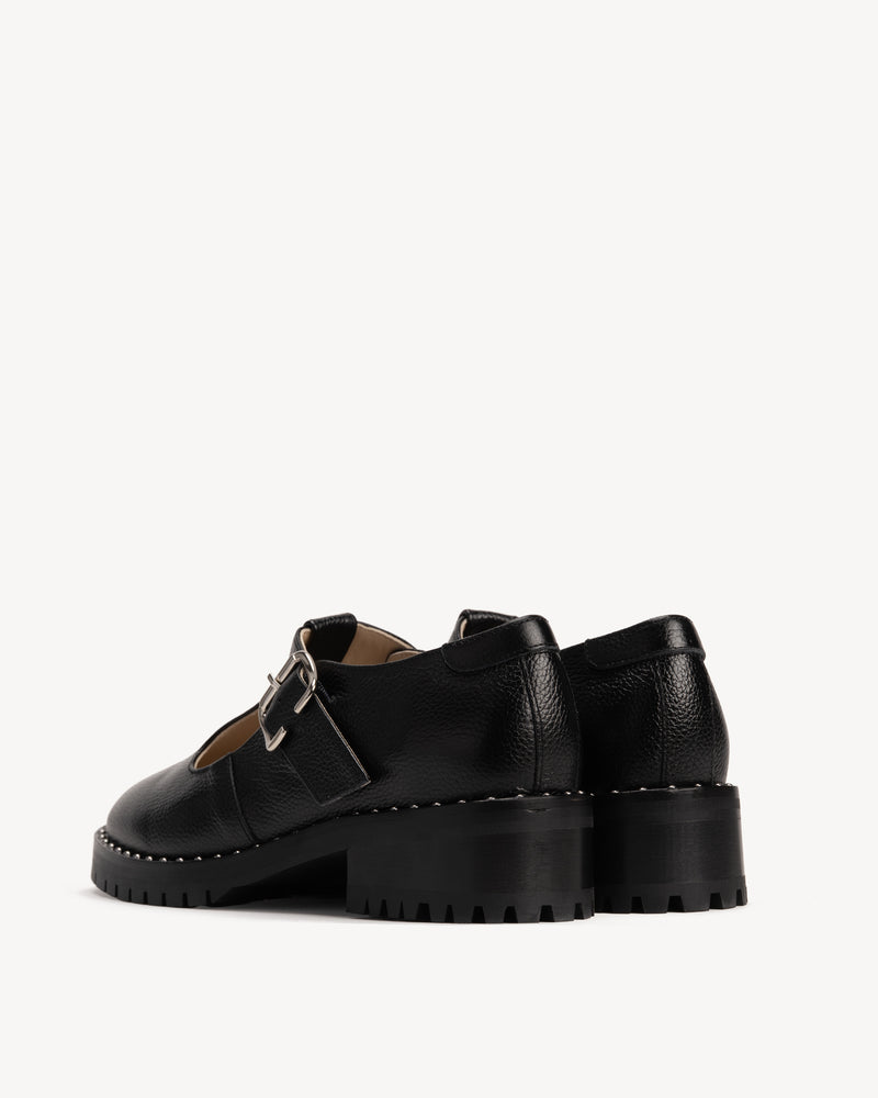 Back view of The Academy Mary Jane Black in pebbled leather. Sizes 5–12