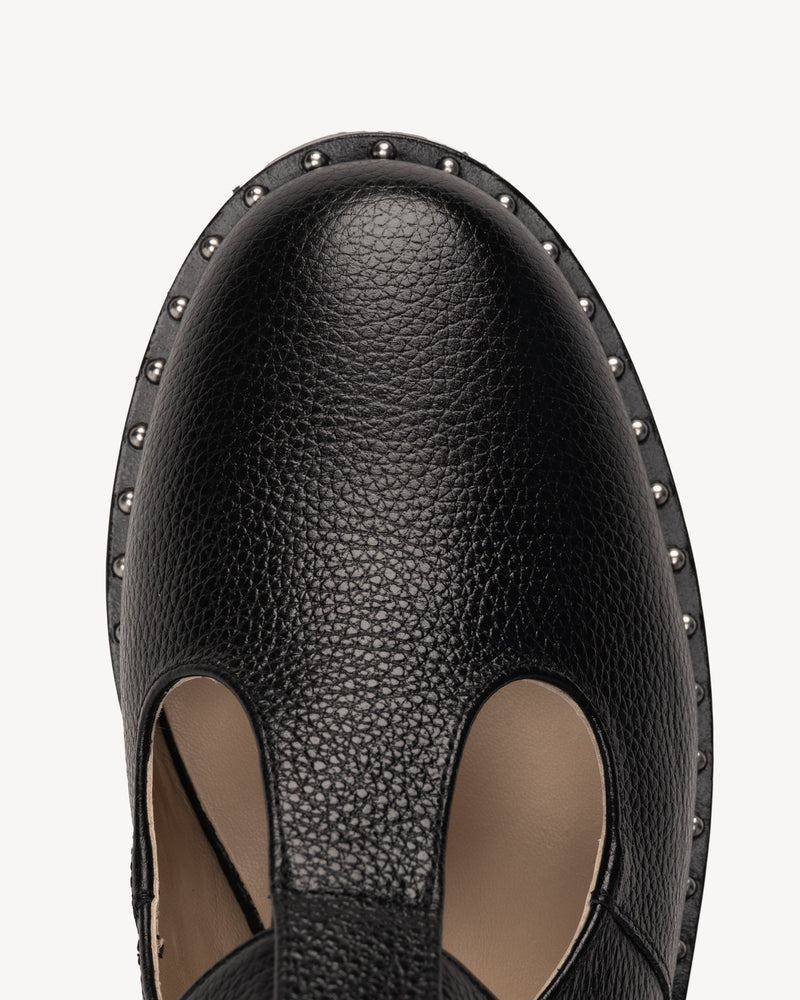 Close-up detail of The Academy Mary Jane Black in pebbled leather. Sizes 5–12