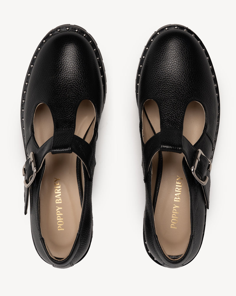 Top view of The Academy Mary Jane Black in pebbled leather. Sizes 5–12