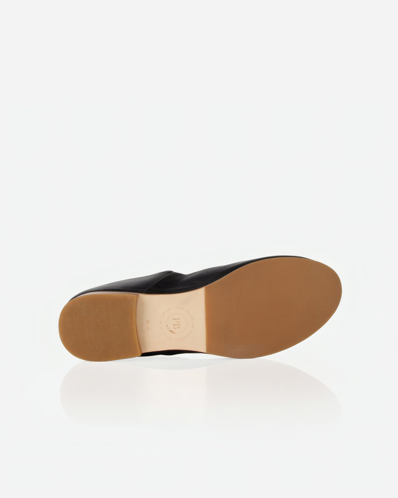 Sole view of The At-Leisure Slip-On 2.0 Black in smooth leather. Sizes 5–12, wide available