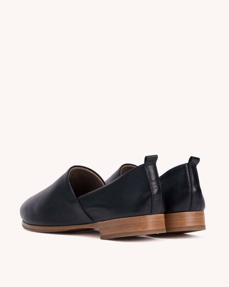 Back view of The At-Leisure Slip-On 2.0 Black in smooth leather. Sizes 5–12, wide available