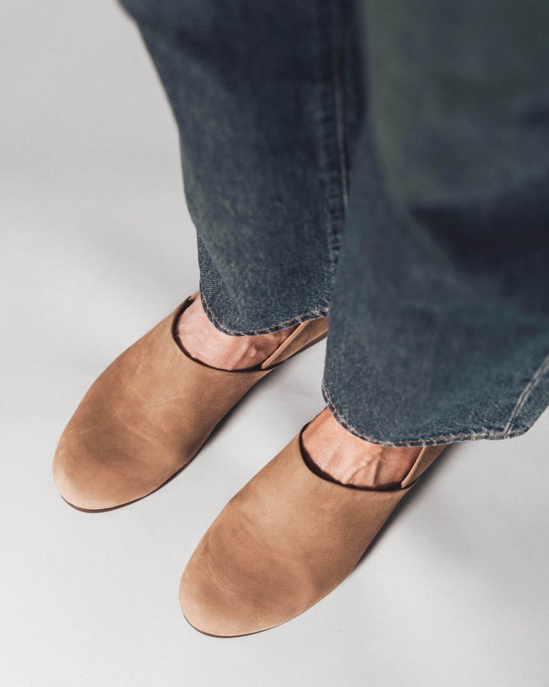 Slip-on shoes, overhead view with jeans. The At-Leisure Slip-On 2.0 Clay Nubuck. Sizes 5–12, available in wide.