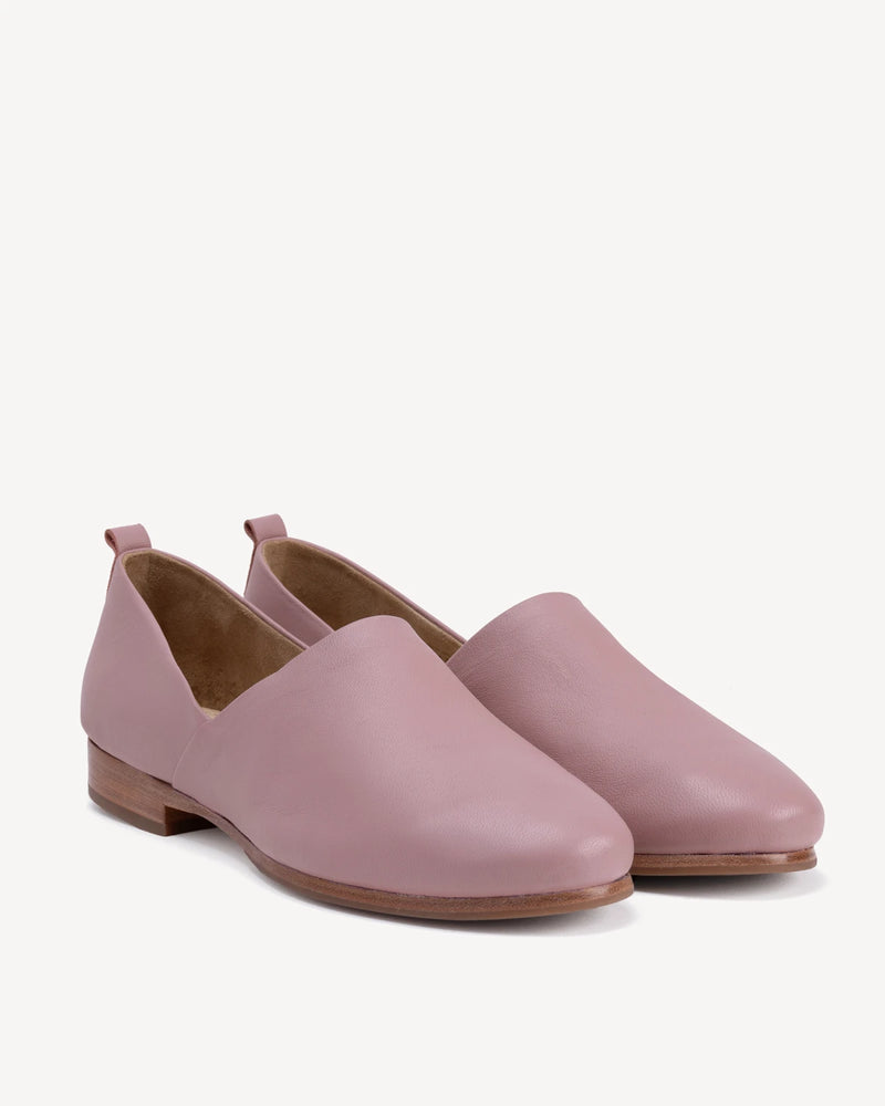 Angled pair view with a rounded toe and seamless upper. The At-Leisure Slip-On 2.0 Dusty Mauve. Sizes 5–12, wide available.