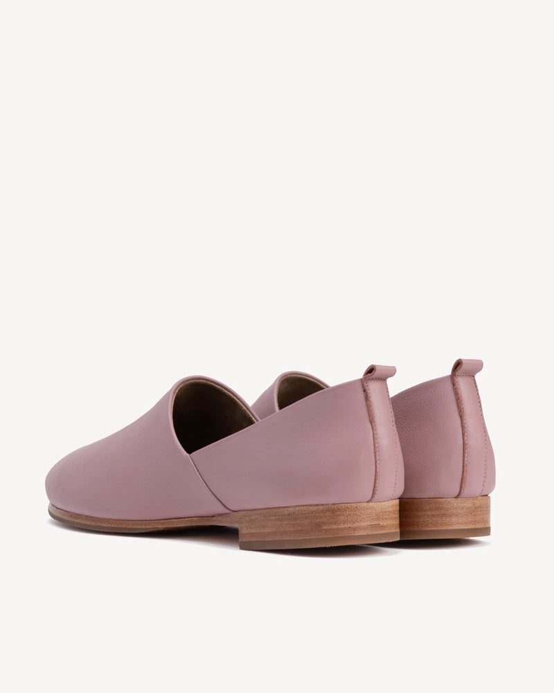 Back view highlighting the heel tab and stacked sole. The At-Leisure Slip-On 2.0 Dusty Mauve. Sizes 5–12, wide available.