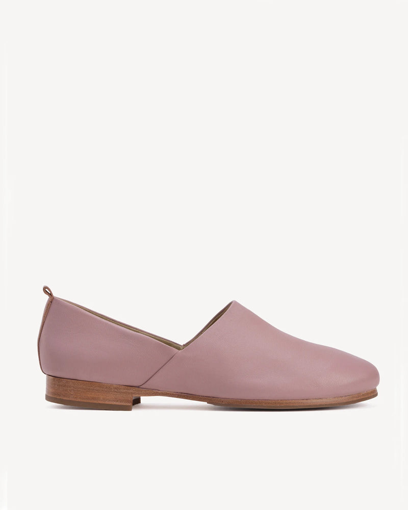 Side view showing smooth leather and a low stacked heel. The At-Leisure Slip-On 2.0 Dusty Mauve. Sizes 5–12, wide available.