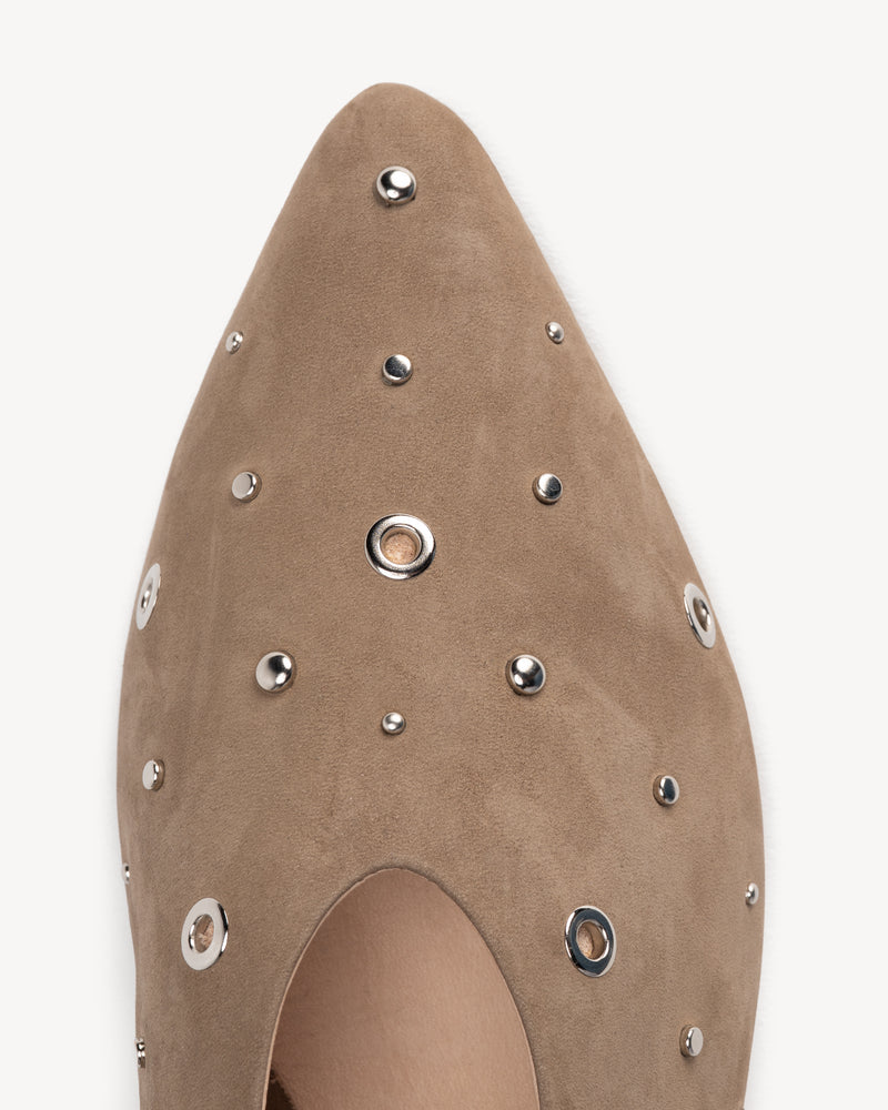 Flat lay of The Atelier Flat Clay Studded in Neutral nubuck. Sizes 5–12, wide available