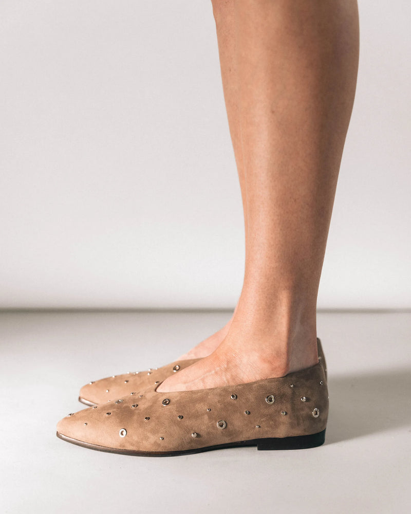 Clay nubuck pointed-toe flats with silver studs, side view. The Atelier Flat Clay Studded. Sizes 5–12, available in wide.