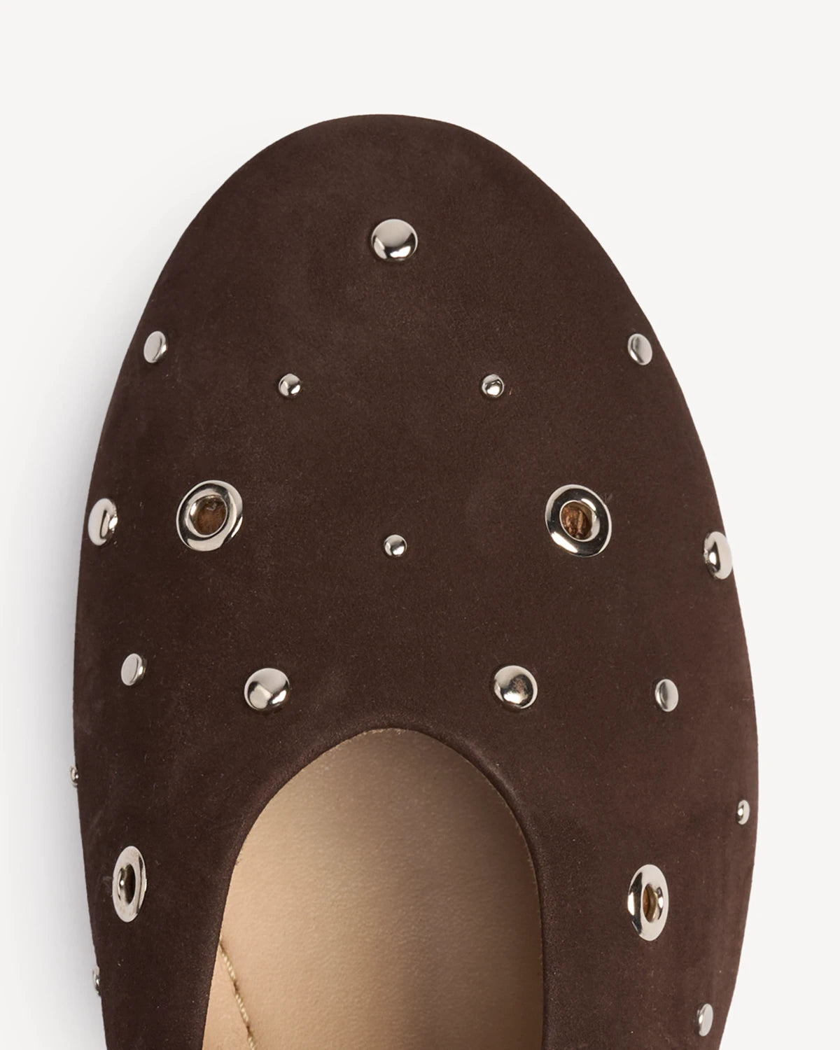 Close-up of scattered studs on a suede mary jane. The BLVD Mary Jane Cocoa Plum Studded. Sizes 5–12, wide available.