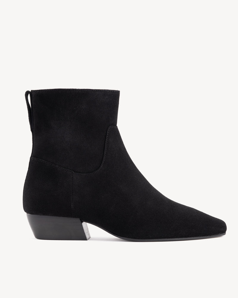 Side view of The Beau Boot Black in suede. Sizes 5–12