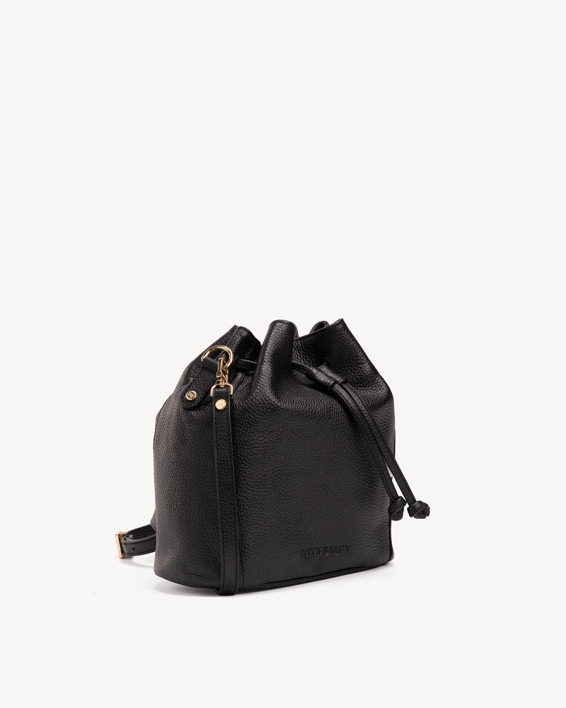 Angled view of The Bondi Bucket Bag Black in leather