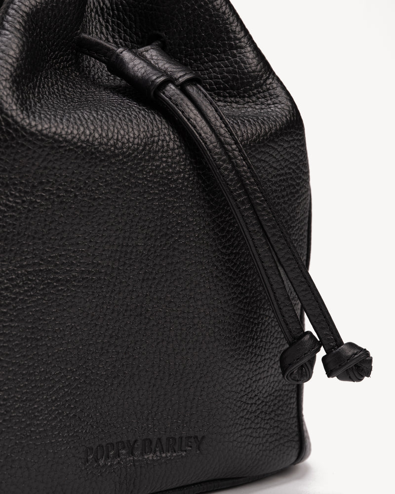 Close-up detail of The Bondi Bucket Bag Black in leather