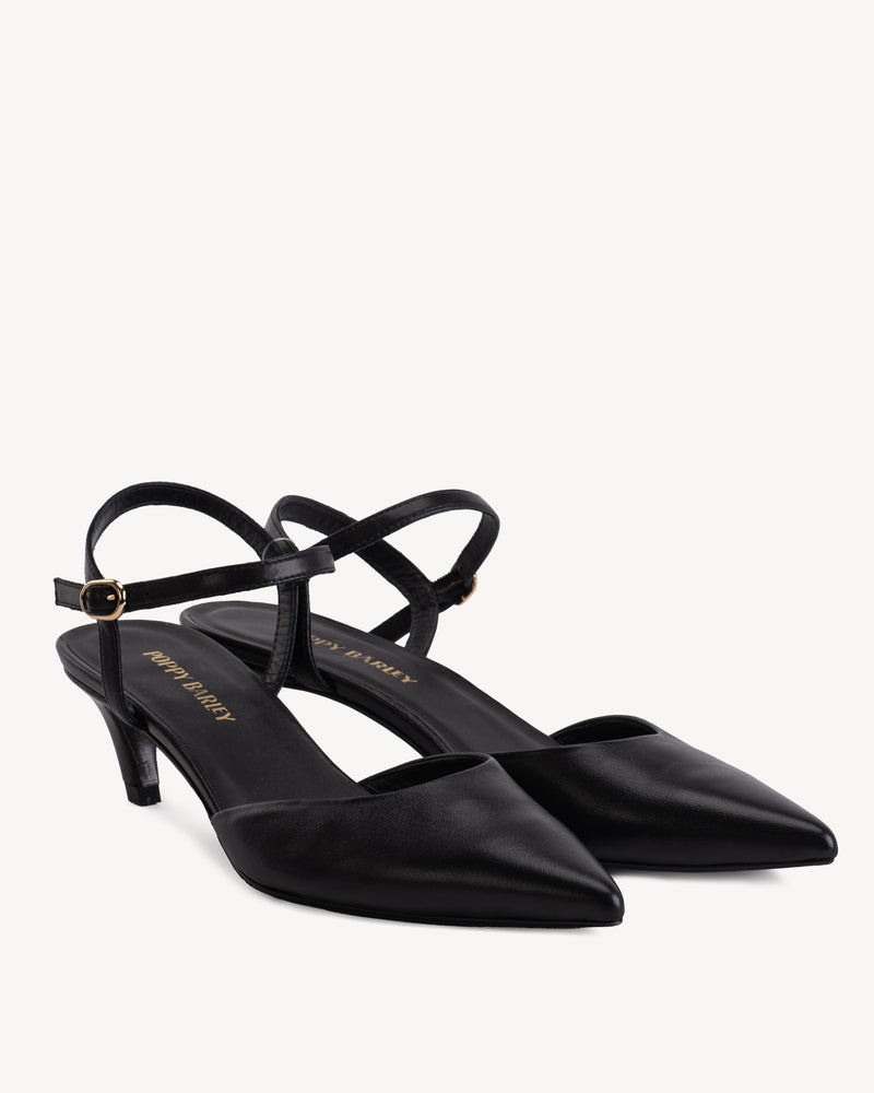 Heel detail of The Claire Kitten Heel Black in Black smooth leather. Sizes 5–12, wide available