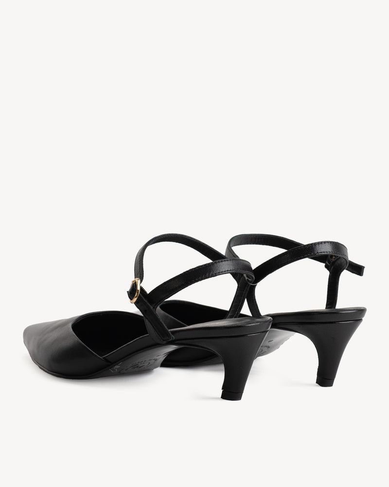 Heel detail of The Claire Kitten Heel Black in Black smooth leather. Sizes 5–12, wide available