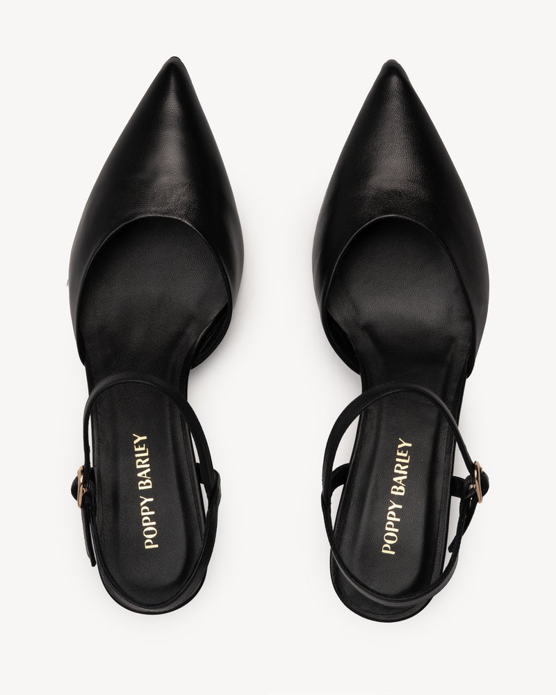 Heel detail of The Claire Kitten Heel Black in Black smooth leather. Sizes 5–12, wide available