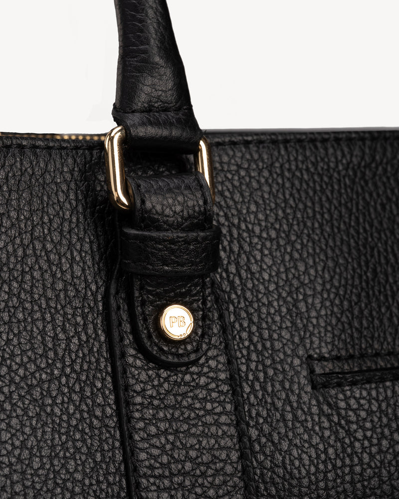 Close-up detail of The Colleague Tote Black in leather