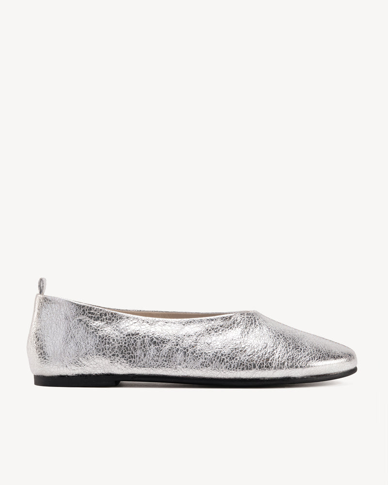 Side view of The Contemporary Ballet Flat Silver in Metallic leather. Sizes 5–12