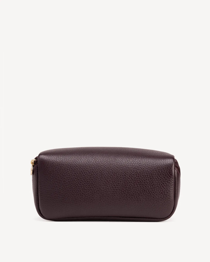 Back view of The Cosmetic Case Small Plum in Purple pebbled leather