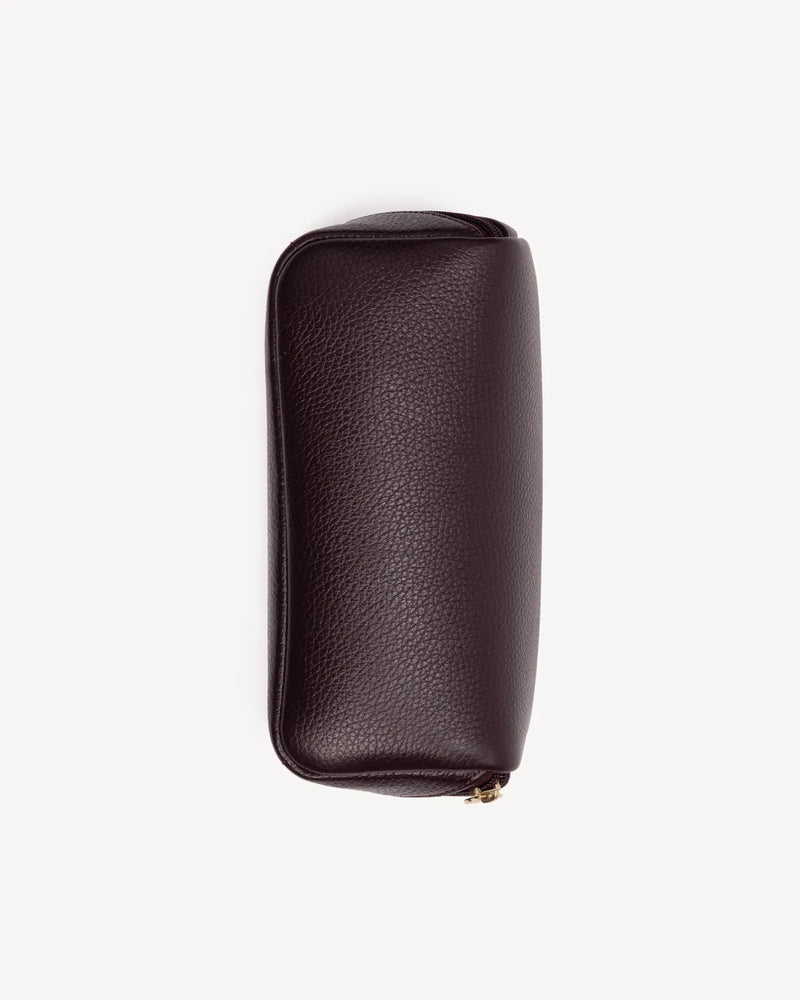 Top view of The Cosmetic Case Small Plum in Purple pebbled leather