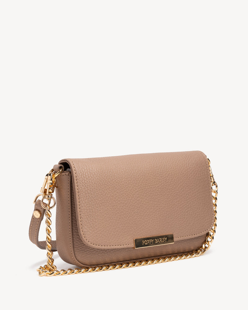 Angled view of The Day To Night Bag Biscotti Pebble in Neutral, Brown pebbled leather