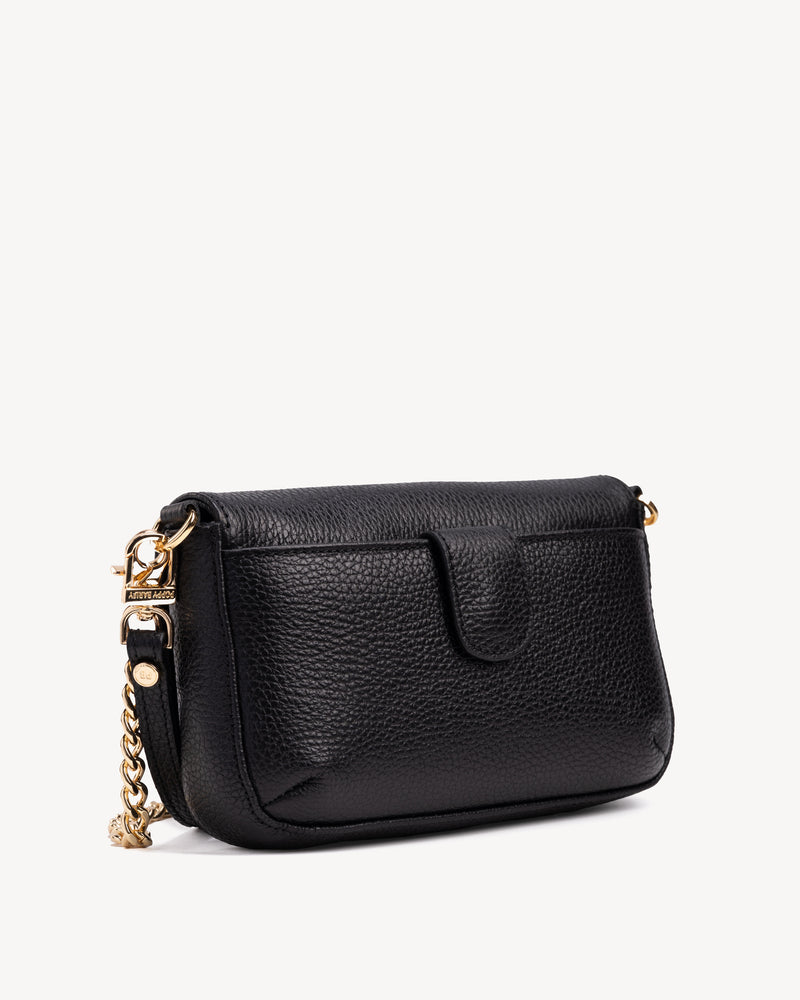 Back view of The Day To Night Bag Black Pebble in pebbled leather