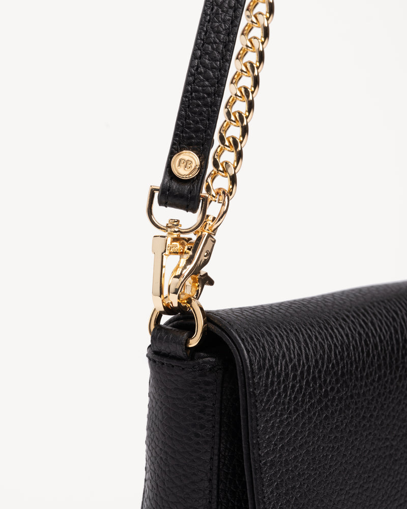 Close-up detail of The Day To Night Bag Black Pebble in pebbled leather