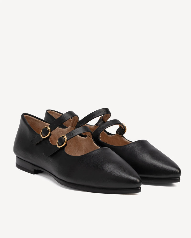 Angled pointed-toe flats with two buckle straps. The Editorial Mary Jane 2.0 Black. Sizes 5–12, wide available.