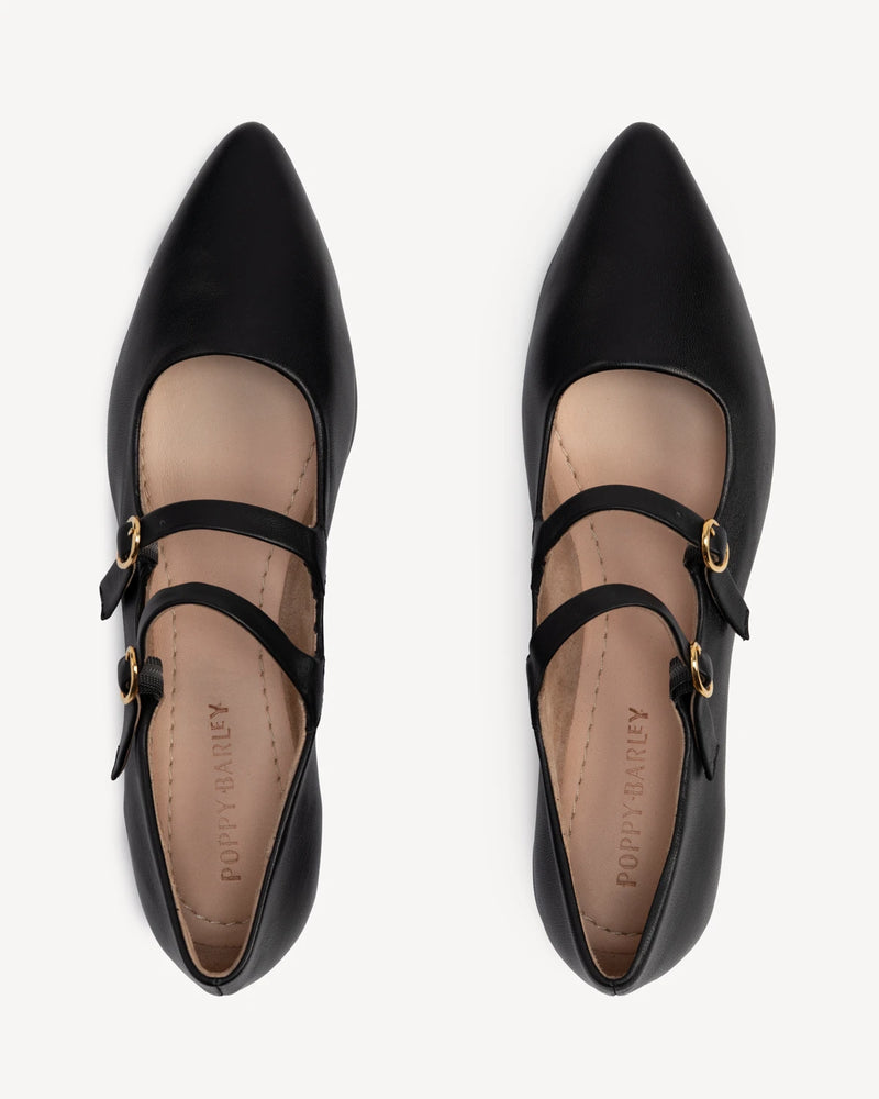 Overhead view of pointed-toe flats, double straps. The Editorial Mary Jane 2.0 Black. Sizes 5–12, wide available.