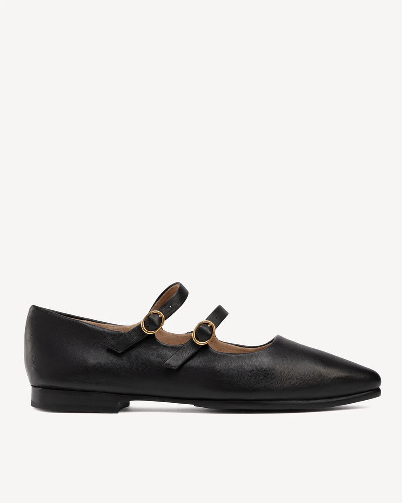 Pointed-toe flat with two thin buckle straps. The Editorial Mary Jane 2.0 Black. Sizes 5–12, wide available.