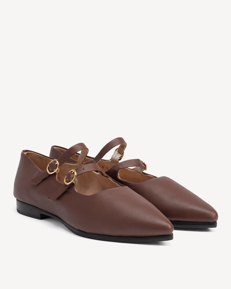 Angled pointed-toe flats with two buckle straps. The Editorial Mary Jane 2.0 French Press. Sizes 5–12, wide available.