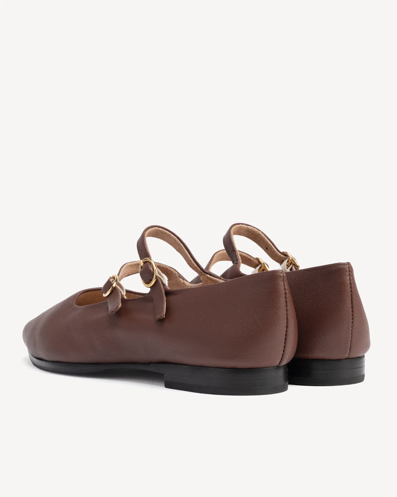 Back view of crisscross strap on pointed flats. The Editorial Mary Jane 2.0 French Press. Sizes 5–12, wide available.