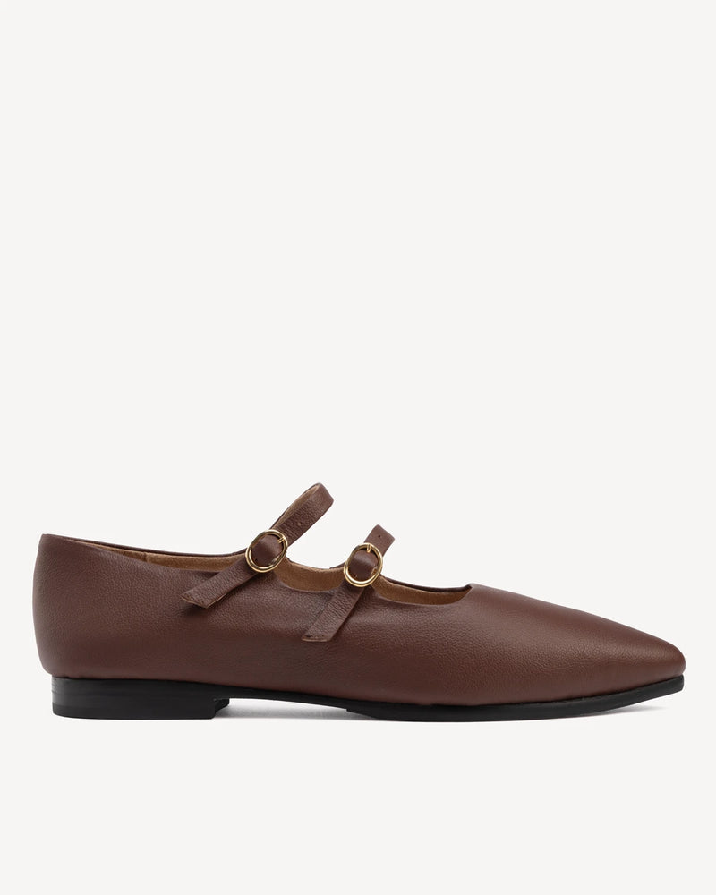 Pointed-toe flat with two thin buckle straps. The Editorial Mary Jane 2.0 French Press. Sizes 5–12, wide available.