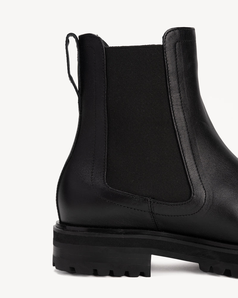 Close-up detail of The Every Way Chelsea Boot Black Water Resistant in smooth leather. Sizes 5–12, wide available.