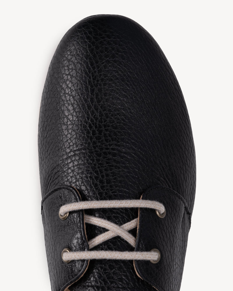 Close-up detail of The Eyelet Oxford 2.0 Black Pebble in pebbled leather. Sizes 5–12, wide available