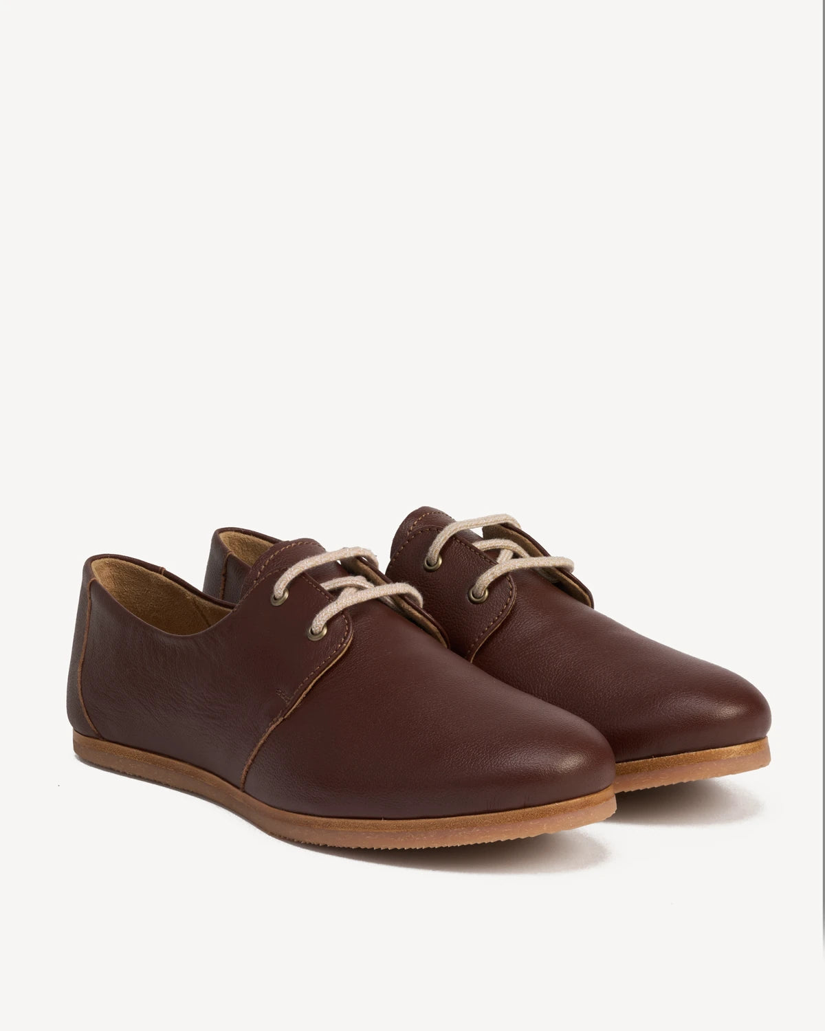 Pebbled-leather lace-up oxfords, angled view. The Eyelet Oxford 2.0 French Press. Sizes 5–12, wide available.