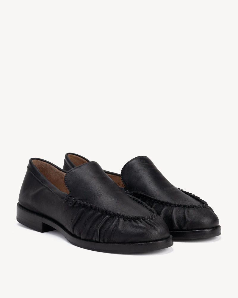 Back view of The Laid Back Loafer Black in smooth leather. Sizes 5–12, wide available