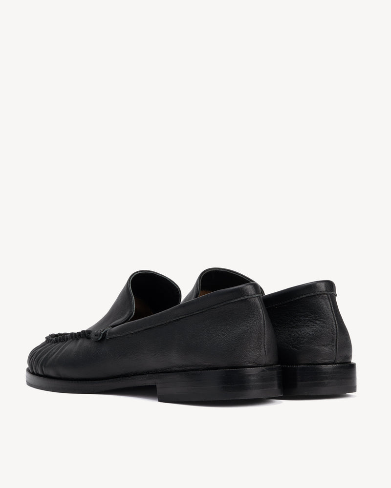 Back view of The Laid Back Loafer Black in smooth leather. Sizes 5–12, wide available