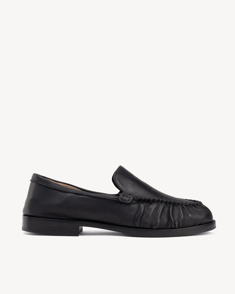 Back view of The Laid Back Loafer Black in smooth leather. Sizes 5–12, wide available