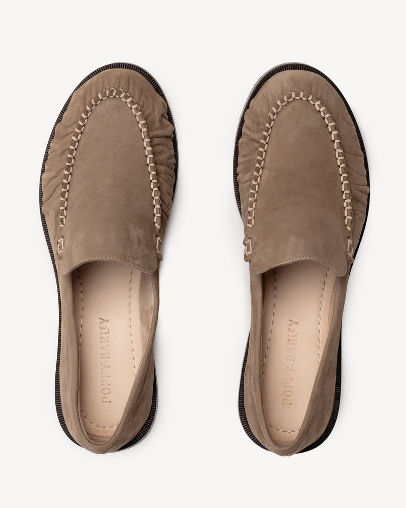 Back view of The Laid Back Loafer Clay Nubuck in Brown, Neutral nubuck. Sizes 5–12, wide available