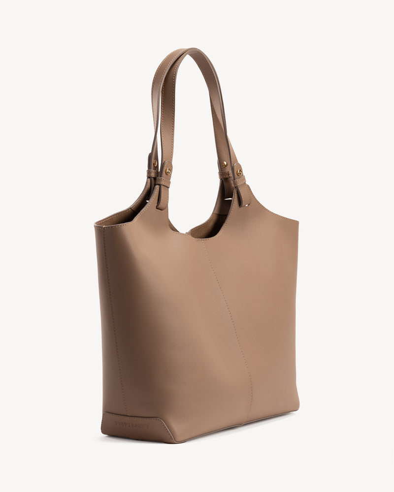 Angled view of The Lisboa Tote Biscotti in Neutral, Brown smooth leather