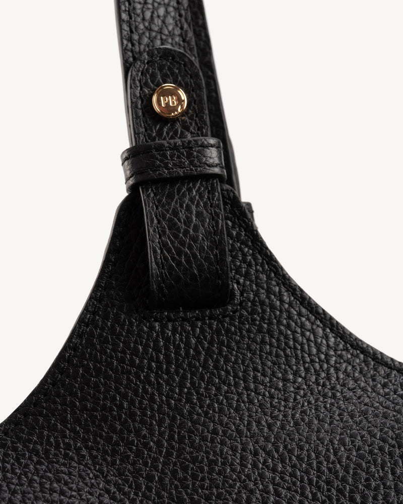 Close-up detail of The Lisboa Tote Black in pebbled leather