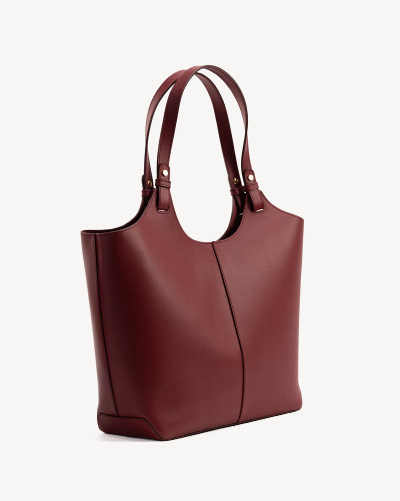 Angled view of The Lisboa Tote Resort Red in Red smooth leather