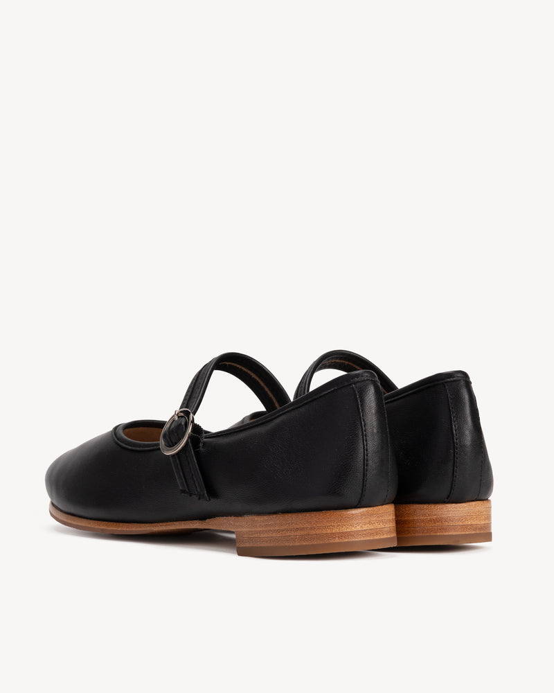 Back view of The Modern-Day Mary Jane Black in smooth leather. Sizes 5–12, wide available