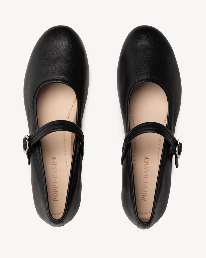 Top view of The Modern-Day Mary Jane Black in smooth leather. Sizes 5–12, wide available