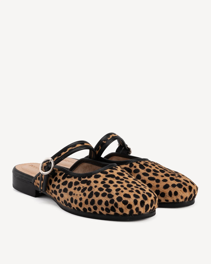 Angled view of The Modern-Day Mule Cheetah Calf Hair in Animal Print leather. Sizes 5–12