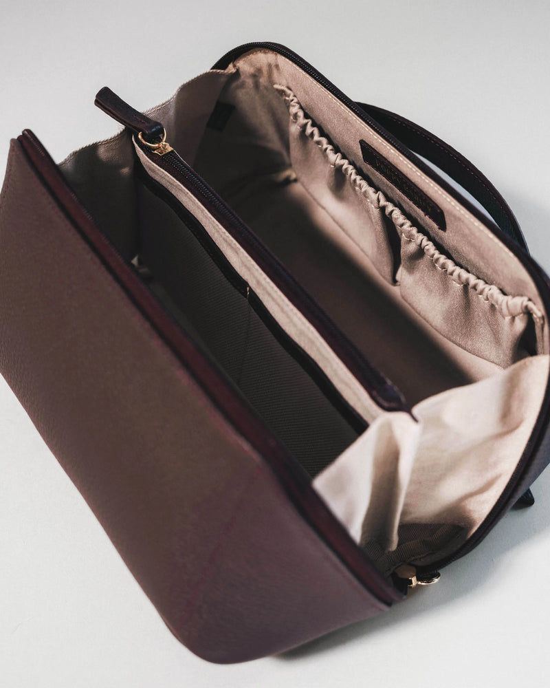 The Cosmetic Case Large Plum in Purple pebbled leather