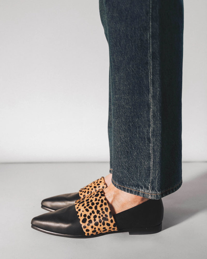 The Luxe Fit Flat Black and Cheetah Calf Hair in Animal Print, Black smooth leather. Sizes 5–12, wide available