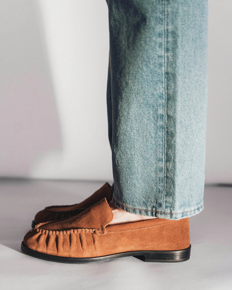 The Laid Back Loafer Hazelnut Suede in Brown suede. Sizes 5–12, wide available