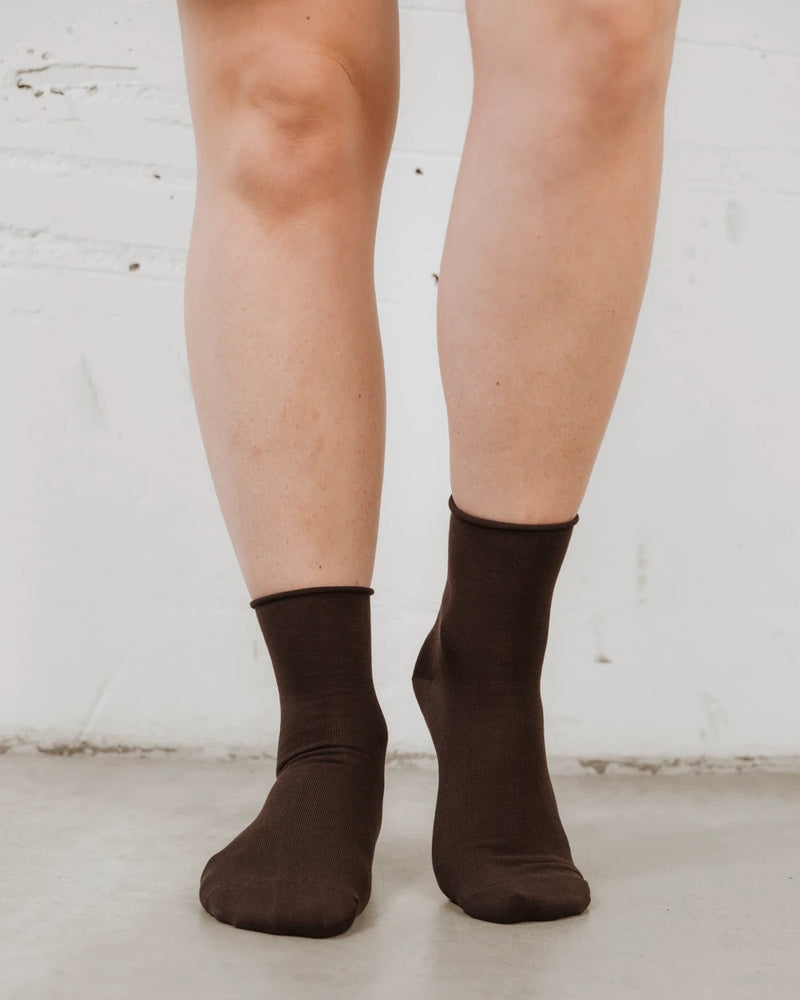 Back view showing rolled cuff and smooth knit texture. The Daily Mid Crew Sock Ganache.