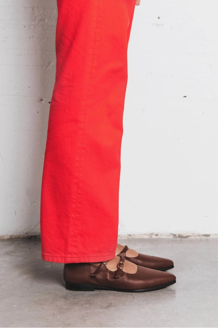 Leg shown wearing pointed-toe flats with double straps. The Editorial Mary Jane 2.0 French Press. Sizes 5–12, wide available.