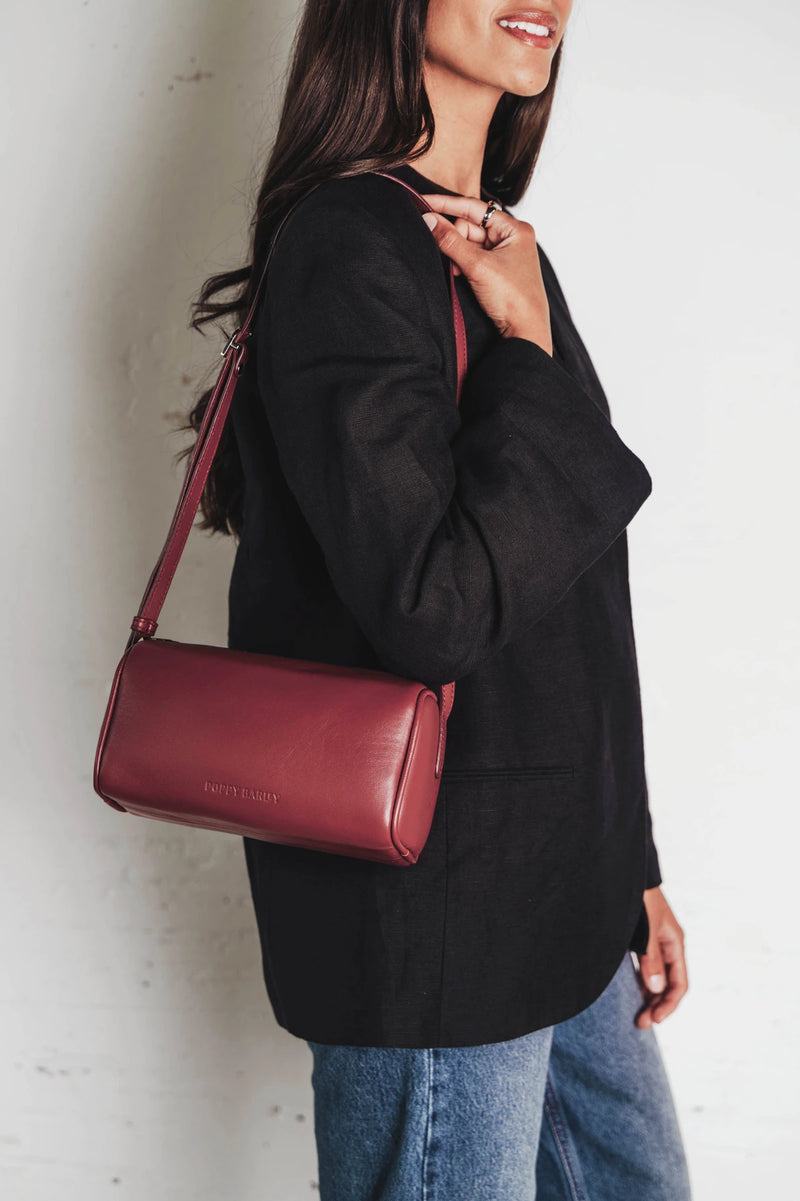 Bag worn crossbody over the shoulder. The Annex Bag Compote.